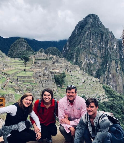 Family in front of Machu Picchu